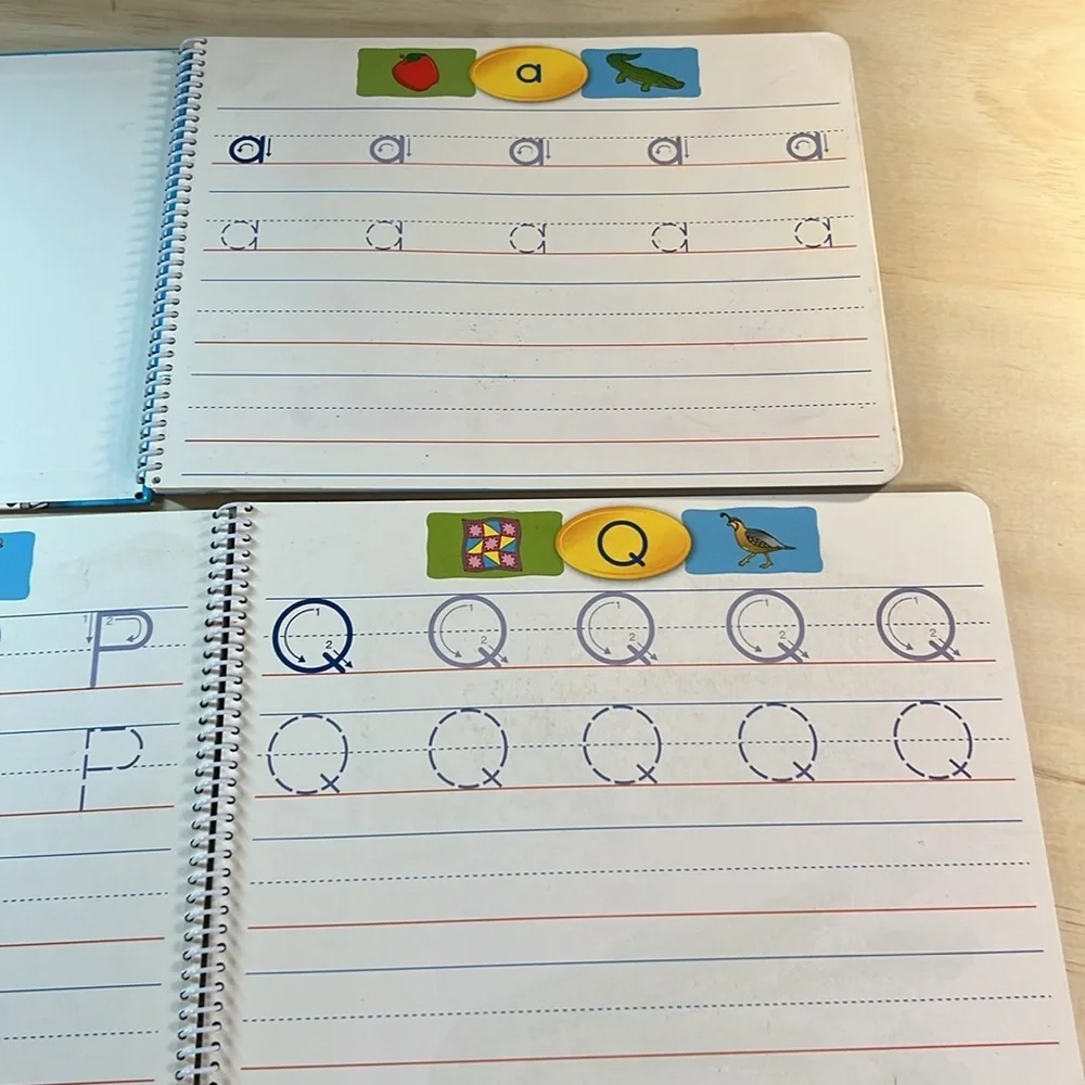 Melissa and Doug Water Wow and Write and Wipe books and dr. Seuss writing paper